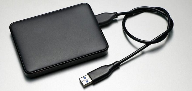 Connect an external hard drive to source PC for transferring files.