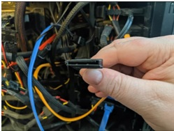 plug on free SATA power connector into SSD